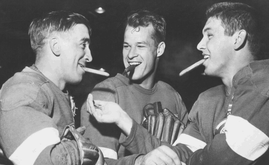 Gordie Howe (center) spent most of his career with the Detroit Red Wings, leading the team to four Stanley Cup championships. He finished his pro hockey career with 1,071 goals and 21 NHL All-Star appearances.
