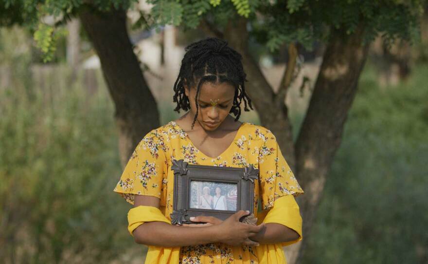 A dancer performs as part of the "Home Within A Home" production, filmed in a park, which streams Dec. 5 and 6, 2020.