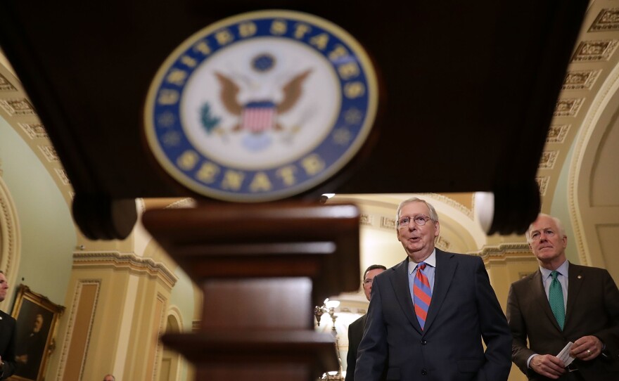 Senate Majority Leader Mitch McConnell, R-Ky., and Senate Majority Whip John Cornyn, R-Texas, (right) prepare to talk to reporters following the weekly Senate Republican policy luncheon at the U.S. Capitol on May 15, 2018.