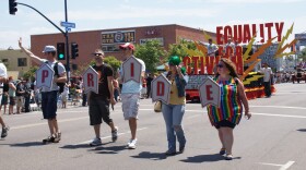 Nearly 9,000 people participated in the San Diego Pride Parade in 2009. Parade marchers are seen here on July 18, 2009.