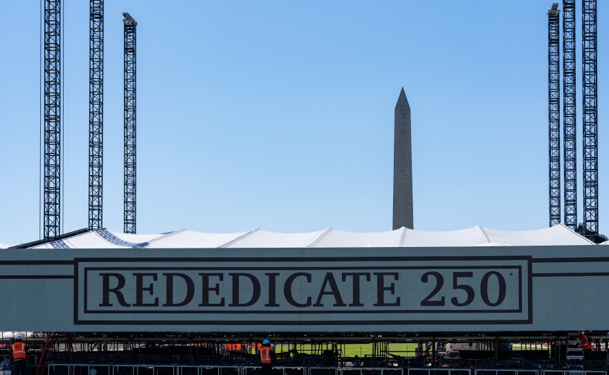 Work continues on the stage for the Rededicate 250 celebration on the National Mall in Washington.