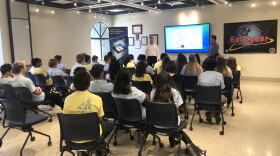 City of San Diego’s Chief Information Security Officer Darren Bennett speaks with students inside a classroom at University of San Diego about cyber security, June 25, 2018.