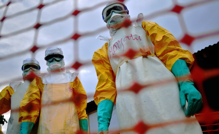 Health workers at the Doctors Without Borders facility in Kailahun wear protective clothing when treating Ebola patients.