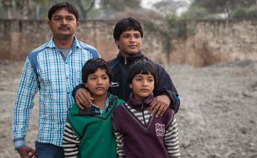Neetu with her husband, Sanjay Kumar, and their twin sons, Prince and Ayush.