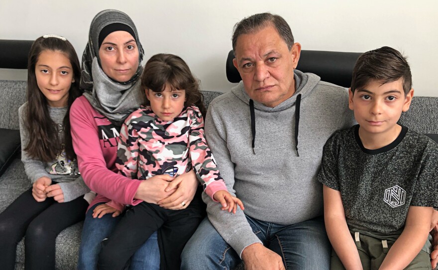 Heba Alrejleh and Radwan Jomaa with children Aya, 11, Lilian, 4, and Mohamed, 10. "The words 'to send us back to Syria' means to destroy our lives," says Jomaa.