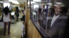A portrait of the Rev. Clementa Pinckney, right hangs on a wall, June 21, 2015, in Charleston, S.C., in the basement of Emanuel A.M.E. Church where the killing of the pastor and eight others occurred in a mass shooting. 