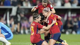 Spain teammates celebrate their victory over England in the final of the Women's World Cup at Stadium Australia in Sydney, Australia, on Sunday.