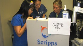 Nurses at Scripps Mercy Hospital in Hillcrest try to keep things moving in the emergency department. 