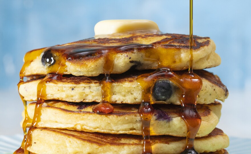 Blueberry pancakes with syrup