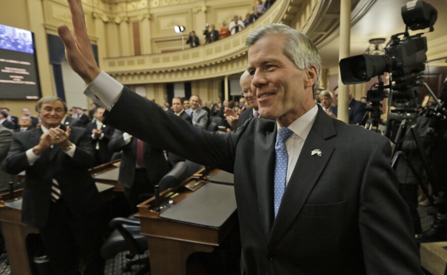 Virginia Gov. Bob McDonnell waves to the crowd after delivering his final State of the Commonwealth address before a joint session of the 2014 General Assembly at the Capitol in Richmond on Jan. 8.