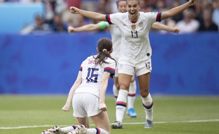 Rose Lavelle celebrates with Alex Morgan and Megan Rapinoe after scoring during the 2019 Women's World Cup final match. All three are back on the American squad this time.