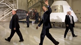 U.S. President Barack Obama (C) waves after speaking at the Operations and Checkout Building at NASA Kennedy Space Center April 15, 2010 in Cape Canaveral, Floridia. Obama is holding a summit to discuss the future of the space program.