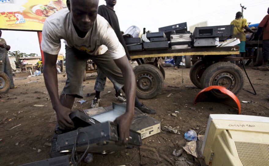 FRONTLINE/World presents a global investigation into the dirty secret of the digital age — the dumping of hundreds of millions of pounds of electronic waste around the world each year. Pictured: In Ghana, a man sorts through electronics to be sold for parts.