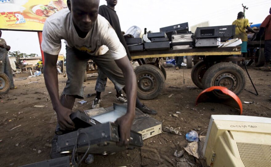 FRONTLINE/World presents a global investigation into the dirty secret of the digital age — the dumping of hundreds of millions of pounds of electronic waste around the world each year. Pictured: In Ghana, a man sorts through electronics to be sold for parts.
