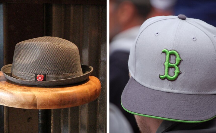 Fedoras are allowed as long as they are in subtle patterns and colors. Baseball caps with sports logos are not allowed.
