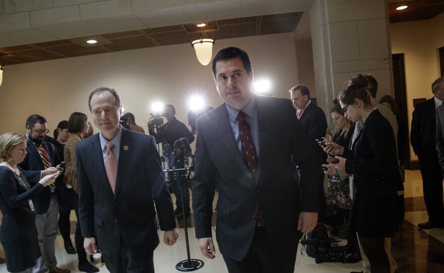 House Intelligence Committee Chairman Rep. Devin Nunes, R-Calif. (right), and the committee's ranking member Rep. Adam Schiff, D-Calif., depart after a briefing with FBI Director Jim Comey about Russian influence on the American presidential election earlier this month