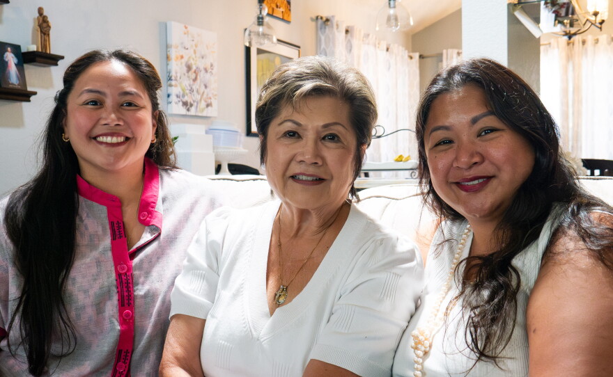 Chelsea Largoza (left), Charlotte Guarnes Fajardo and Cindy Villamora Henderson sit for a portrait photo