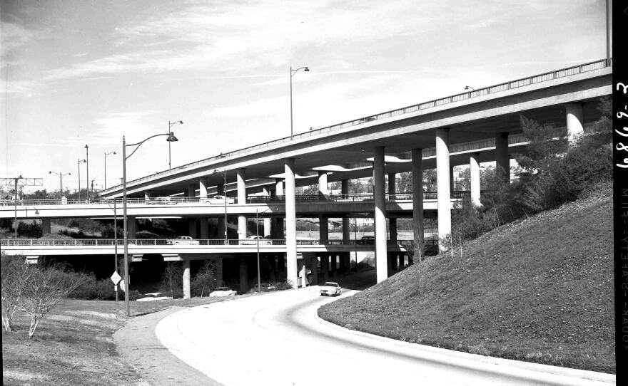 Four-level interchange of the 110 and 101 freeways looking northwest, 1956.