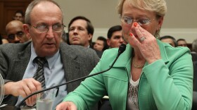 Eddie Smith (L) and Rhonda Smith (R) of Sevierville, Tennessee testify about her gas pedal sticking while James Lentz (C) president and COO of Toyota Motor Sales, U.S.A., Inc. listens during a House Energy and Commerce Committee hearing on Capitol Hill on February 23, 2010 in Washington, DC. 