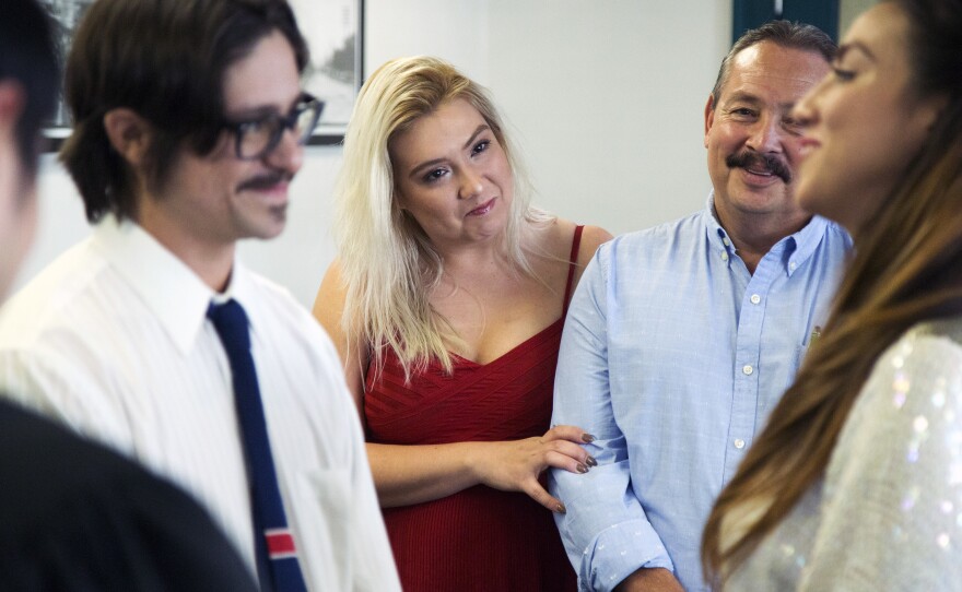 Andrea De La Vega watches as her sister Claudia gets married at the Austin courthouse.