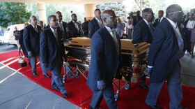 Pallbearers carry the gold casket of legendary singer Aretha Franklin after arriving at the Greater Grace Temple in Detroit, Friday, Aug. 31, 2018. Franklin died Aug. 16 of pancreatic cancer at the age of 76.