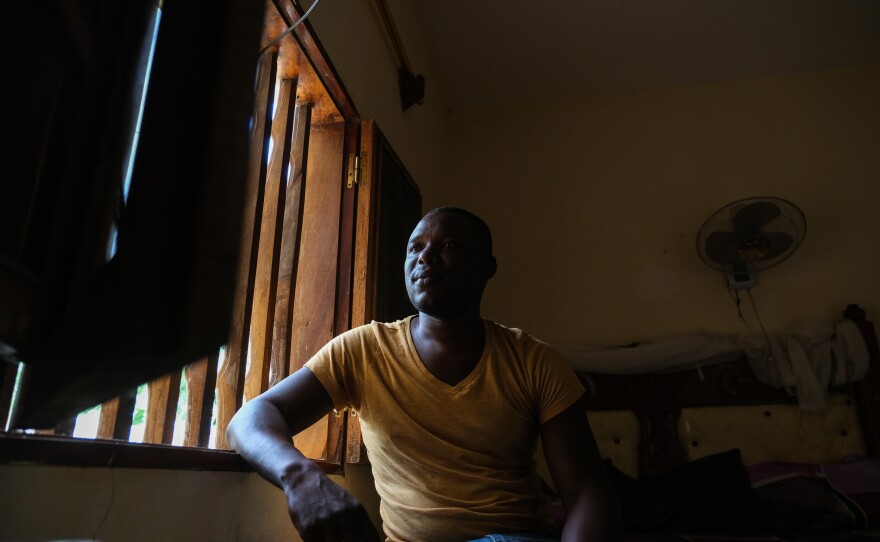 Mamadou Niang at his home in Gandiol, Senegal, on Oct. 6. Mamadou's father worked their family farmland until he died in 2006, and Mamadou would have liked to follow in his footsteps. But he can't, he says, because rising seas are pushing salt water into the fields.