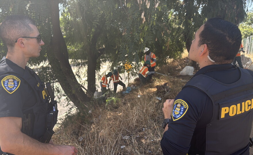 Police observe an abatement on July 30, 2026.