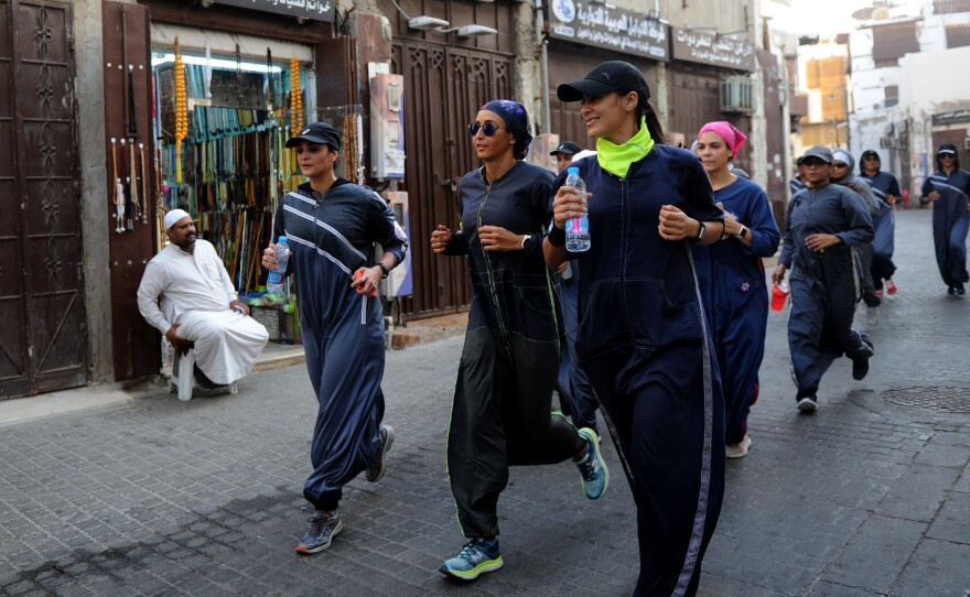 Saudi women jog in the streets of Jeddah in March. The government is encouraging greater participation by women in sports.