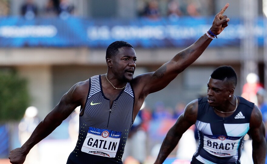 Justin Gatlin celebrates victory in the 100 meters at the U.S. Olympic Trials for track and field. Gatlin has been suspended twice for failing doping tests, once in 2001 and again in 2006.