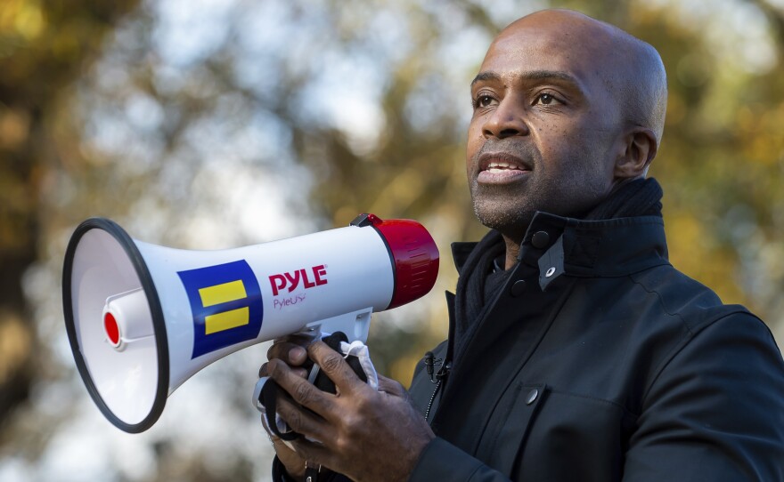 Human Rights Campaign president Alphonso David speaks to supporters on Saturday Dec.19, 2020 during a get-out-the-vote event at a private residence in Dunwoody, Ga. David has filed a lawsuit against the organization in federal court, alleging that he was underpaid and then terminated because he is Black.