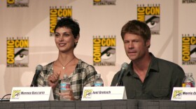 Actors Morena Baccarin and Joel Gretsch speak during the "V" panel at Comic-Con International on July 25, 2009.