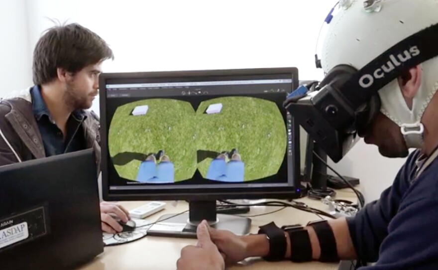Part of the training in Miguel Nicolelis' research involves having a patient with spinal cord damage learn to use an avatar to walk in virtual reality, while being given visual and tactile feedback.