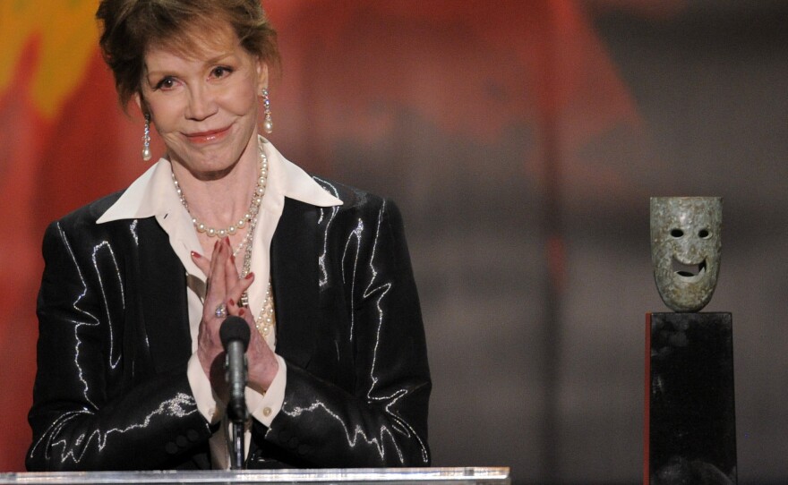 Moore accepts the Screen Actors Guild Life Achievement Award in 2012.