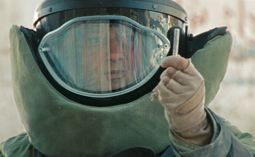Jeremy Renner in the protective suit in "The Hurt Locker"