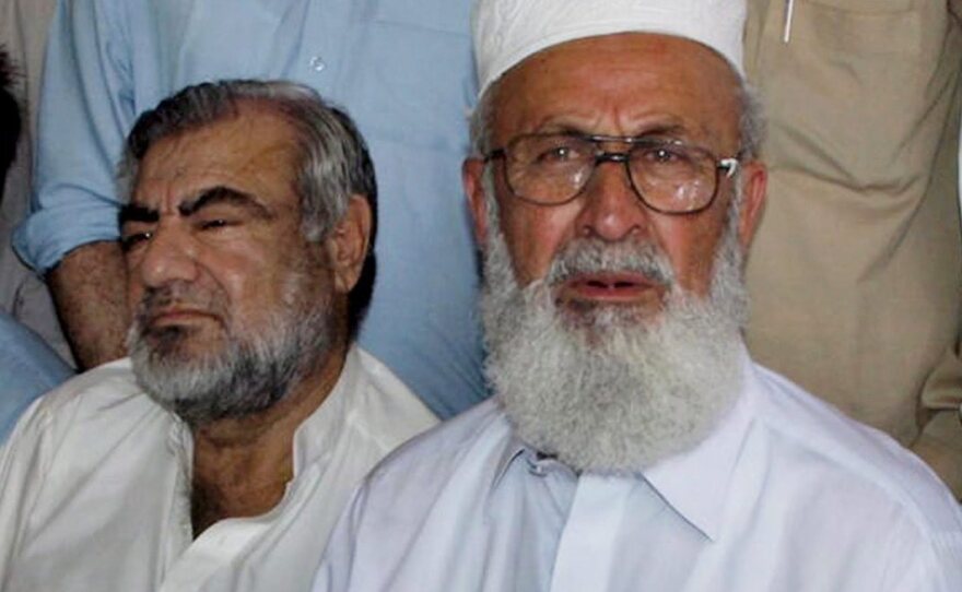 Ajmal Khan, vice chancellor of Islamia College University, talks with journalists after his release from Taliban captivity in August.