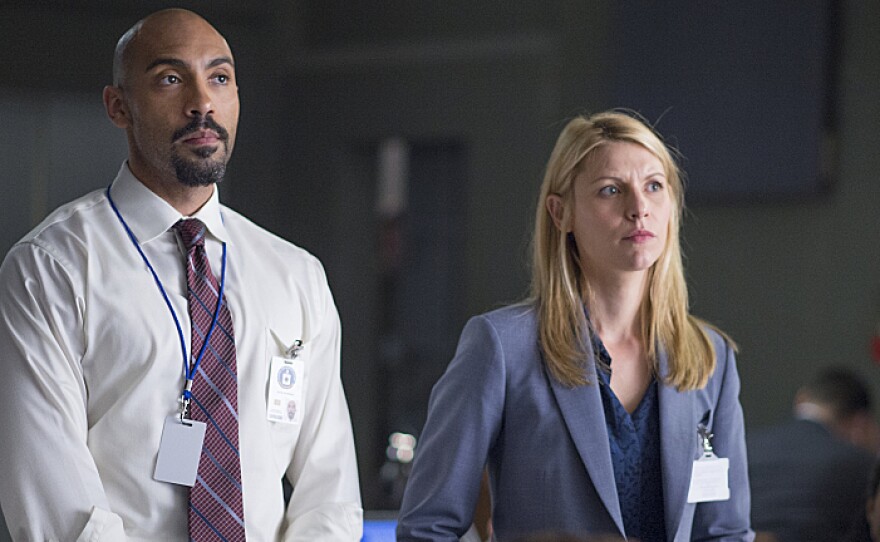 Claire Danes, right, plays CIA station chief Carrie Mathison with Alex Lanipekun on Showtime's Homeland.