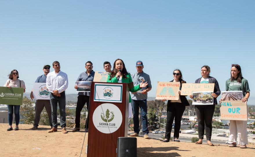 Environmental advocates and elected officials, including San Diego County Supervisor Paloma Aguirre (center), say that a trade deal with Mexico must include solutions to the Tijuana River sewage crisis at a press conference in Otay Mesa West on July 16, 2026. 