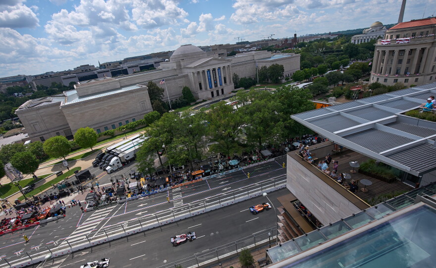 Drivers compete during the IndyCar Freedom 250 Grand Prix auto race.