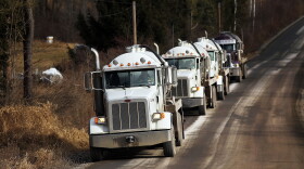 Trucks with the natural gas industry, some of the thousands that pass through the area daily, drive through the countryside on January 18, 2012 in Springville, Pennsylvania.