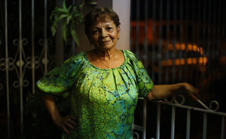 Genoveva "Veva" Camacho, 74, raised her family in Puerto Rico, and still lives in the town of Cabo Rojo with her grandson, Edward. Her daughters, Arlene and Genoveva, as well as her granddaughter, Didra, all moved to Orlando in search of a better life. A poor economy and increased crime are contributing to an exodus from the island.