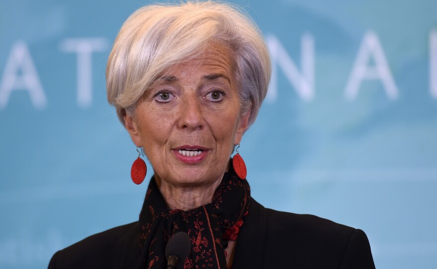 IMF Managing Director Christine Lagarde speaks during a news conference in Washington, to announce the Chinese yuan will join a basket of the world's leading currencies.