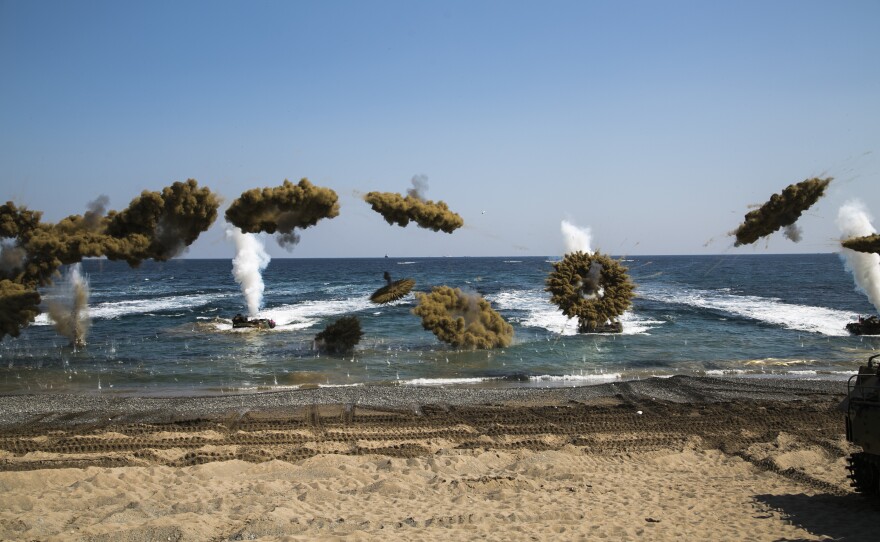 Members of the U.S. Marine Corps, Republic of Korea Marines Corps, New Zealand Army and Australian Army conduct amphibious assault training at Doksukri Beach, South Korea, March 12, 2016.