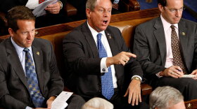 Rep. Joe Wilson (R-SC) shouts as President Obama addresses a joint session of Congress on Sept. 9, 2009.