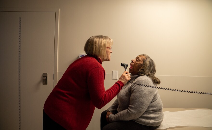 Dr. Laura Cheever helps Brooks-Wiggins stay on top of her HIV, a diagnosis she's lived with since the 1980s. Effective treatments have kept her alive and healthy.