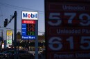 Gasoline prices are displayed at a Mobil gas station on April 29 in Portland, Ore.