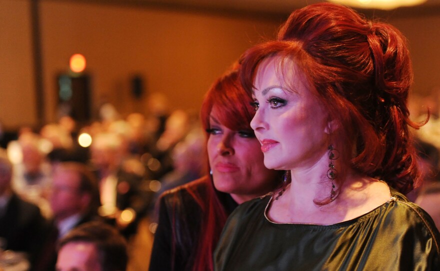 Wynonna Judd (left) and Naomi Judd at the 2011 Country Radio Seminar, where they received the Country Radio Broadcasters' Career Achievement Award.