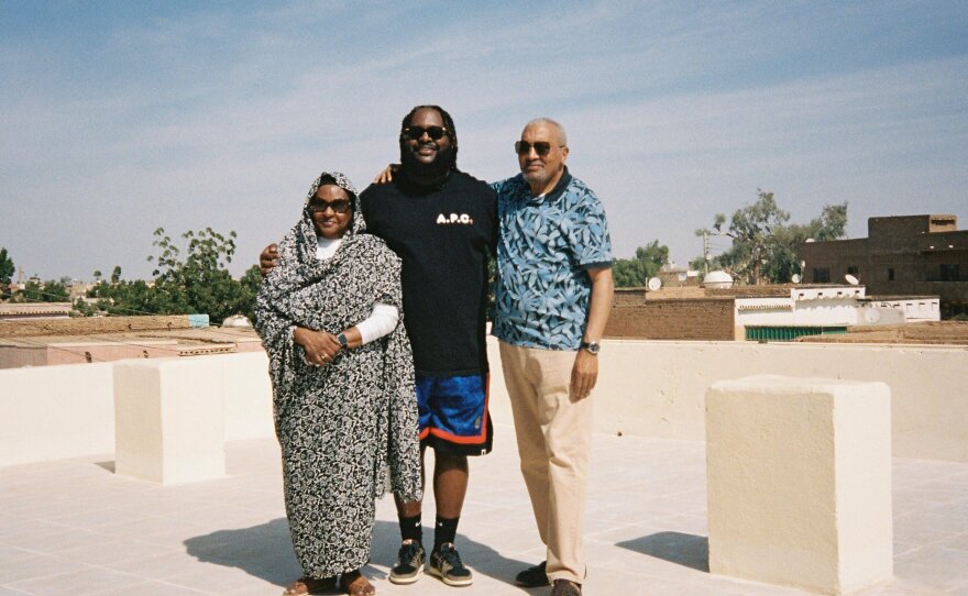 Picture of Sudanese American rapper Bas, with family in Khartoum, during happier times.