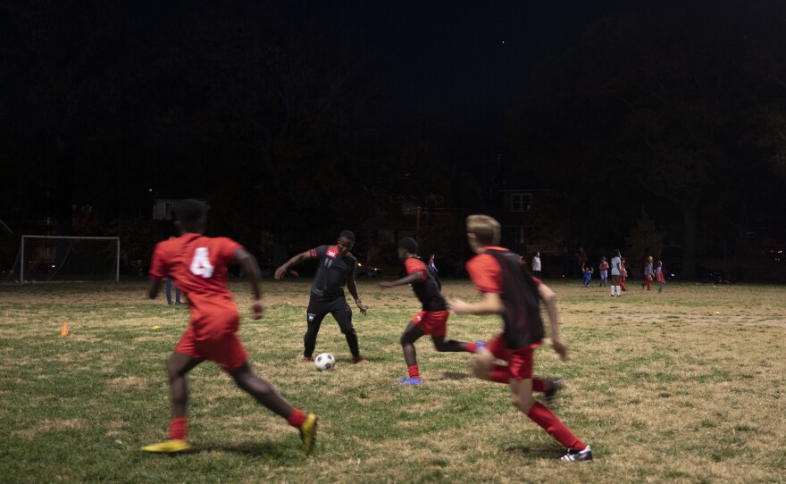 Coach Pierre Hedji plays alongside his team.