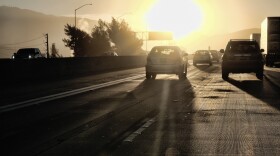 Photo morning commuters drive into downtown Los Angeles as the sun rises along Interstate 5, Aug. 31, 2018, 2018. 