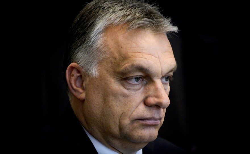 Hungarian Prime Minister Viktor Orban, pictured at a meeting with Polish president on May 14, campaigned on an anti-immigrant platform. On Monday the right-wing party passed legislation banning aid organizations and individuals from helping asylum-seekers.